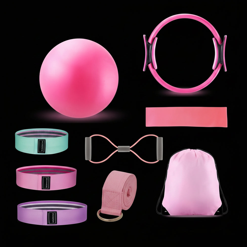  various pink fitness products including a ball, resistance bands, and a drawstring bag on a black background.