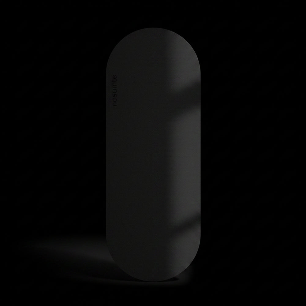 black color Yoga Mat shot in a black studio background