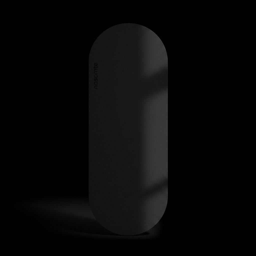 black color Yoga Mat shot in a black studio background