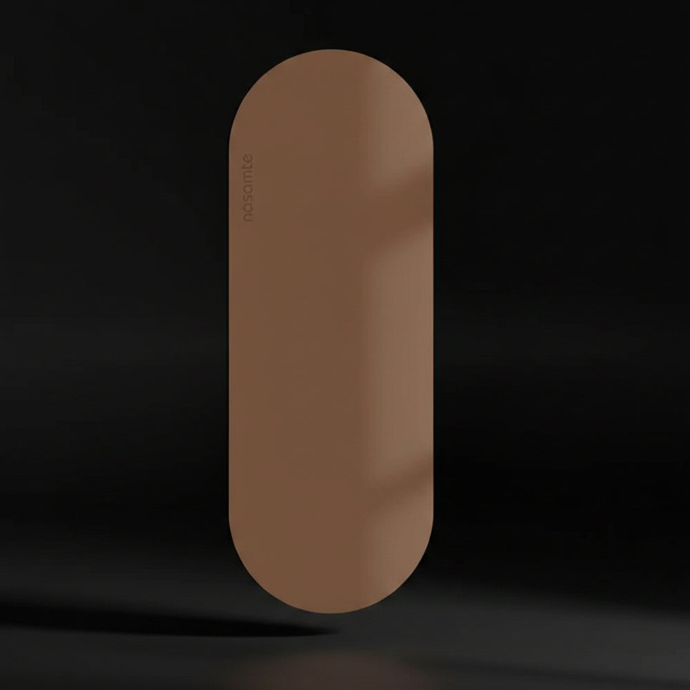 coffee color Yoga Mat shot in a black studio background