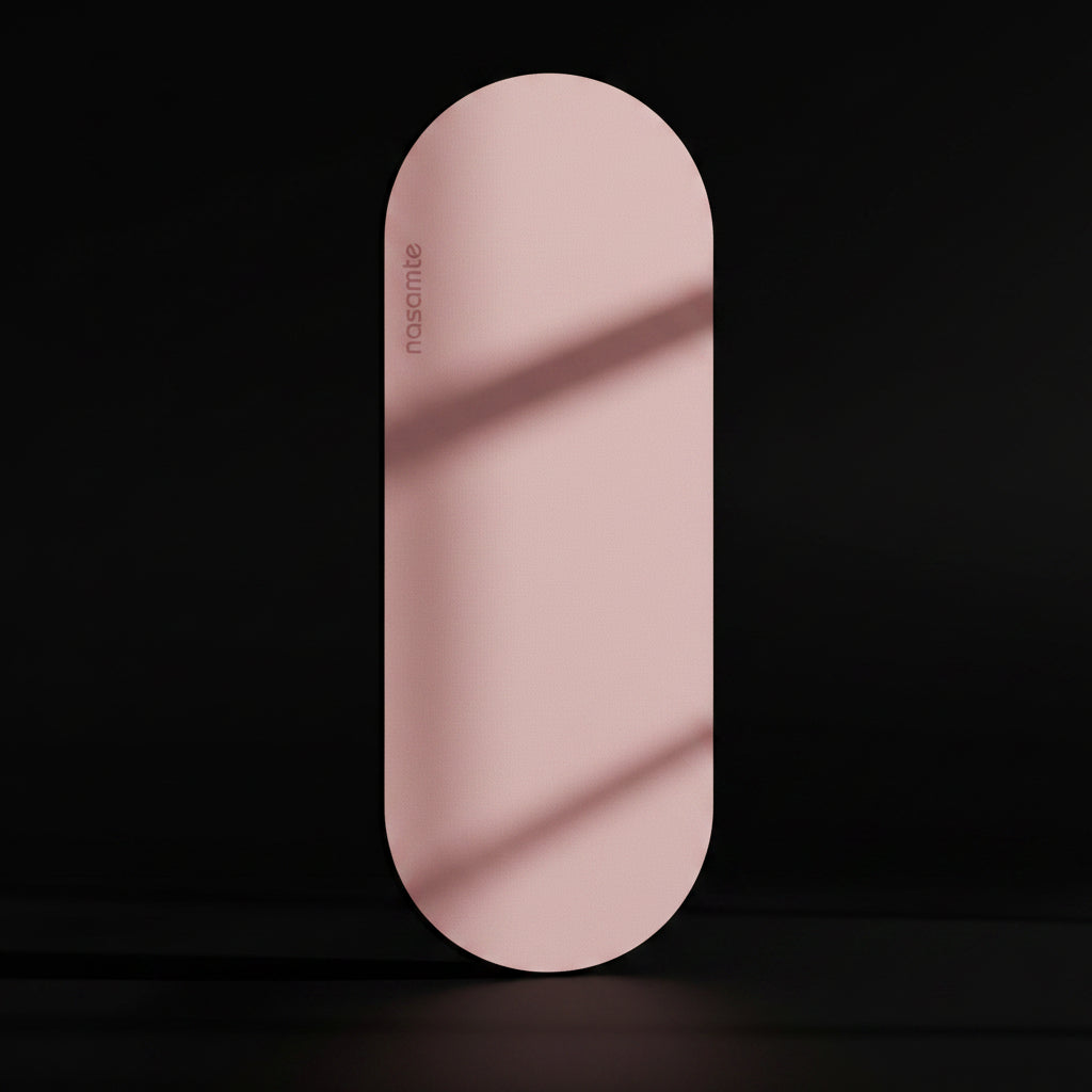 Pink Yoga Mat shot in a black studo background